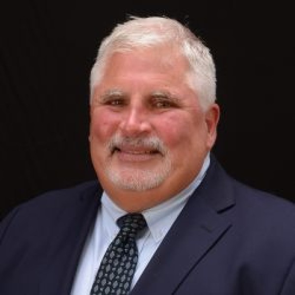 Raymond Conover, ARe, FLMI, MCM